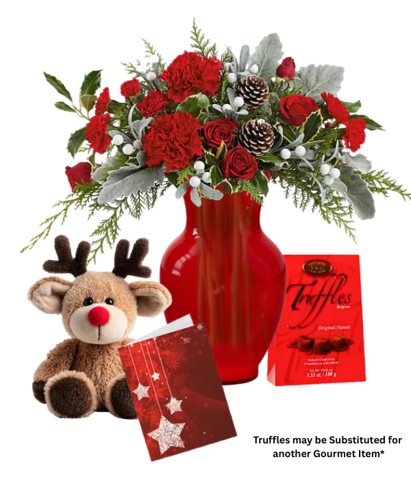 Christmas Cabin floral arrangement with reindeer and truffles.