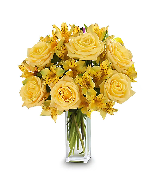 Bouquet of yellow roses in a vase.