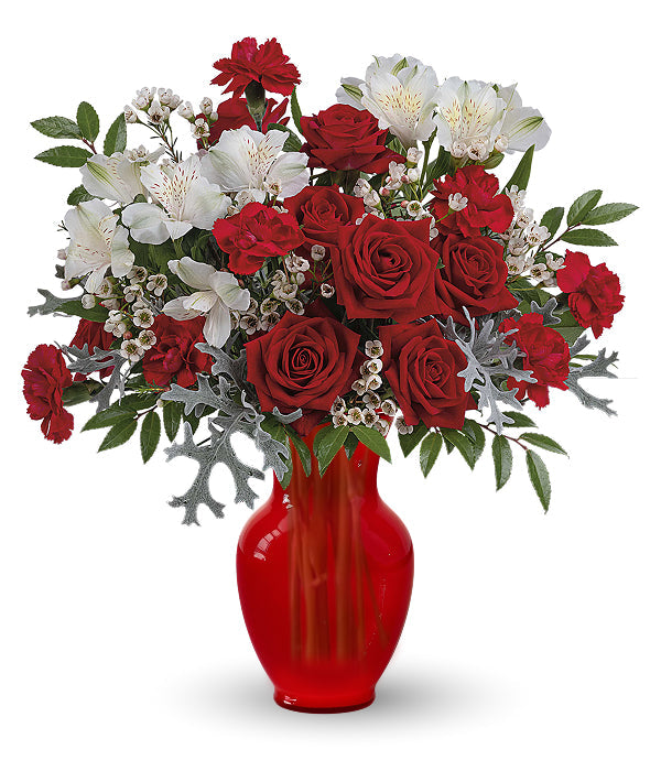 Red roses & white flowers in a red vase