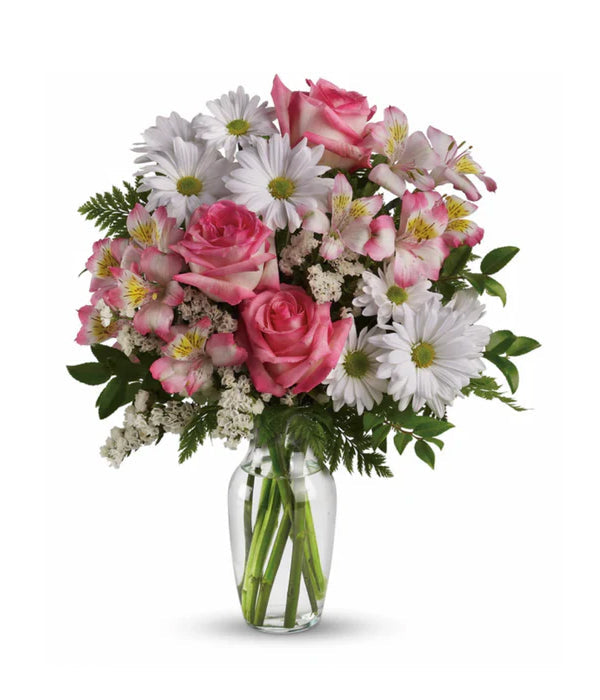 Beautiful floral bouquet with pink roses and daisies