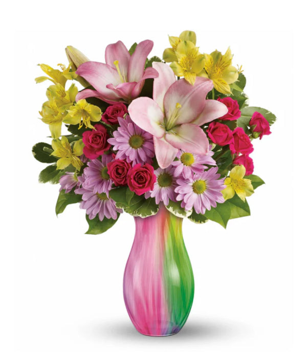 Shades of Spring flower bouquet in a colorful vase